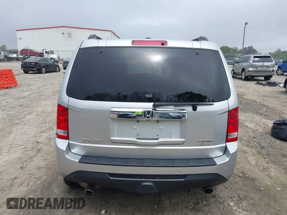 2014 Honda Pilot Touring with VIN 5FNYF4H91EB011934, listed as a IAAI auction lot 41929415 with 227,343 mi miles and . Bid and sale history available at DreamBid. Image 16.