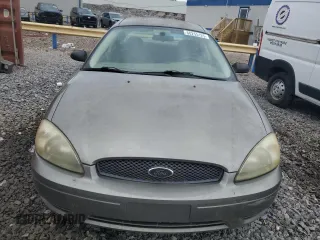 2004 Ford Taurus SE with VIN 1FAFP53274A193186, listed as a Copart auction lot 60255125 with 184,493 mi miles and Salvage title. Bid and sale history available at DreamBid. Image 5.