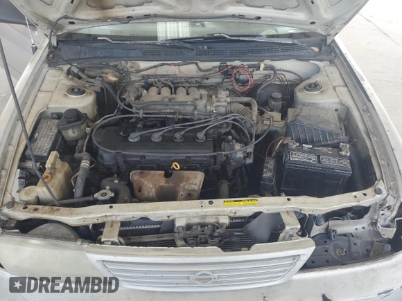 1997 Nissan Sentra XE z VIN 3N1AB41D3VL015032, wystawiony jako Copart lot #47238005 z przebiegiem 266 146 mil mil oraz Szkoda całkowita • Salvage title. Historia ofert i sprzedaży dostępna na DreamBid. Obrazek 11.