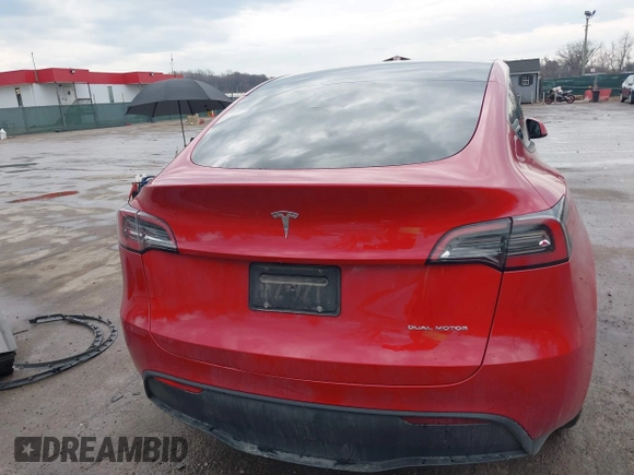 2023 Tesla Model Y Long Range with VIN 7SAYGDEE1PA169031, listed as a IAAI auction lot 41660766 with 35,253 mi miles and . Bid and sale history available at DreamBid. Image 17.