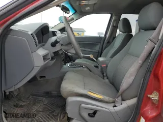 2006 Jeep Grand Cherokee Laredo with VIN 1J4HR48N66C296627, listed as a Copart auction lot 49120215 with 170,635 mi miles and Salvage Title. Bid and sale history available at carsss.com. Image 7.