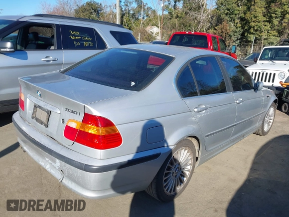 2003 BMW 3 Series 330xi with VIN WBAEW53493PN30296, listed as a IAAI auction lot 41429776 with 233,013 mi miles. Bid and sale history available at carsss.com. Image 4.
