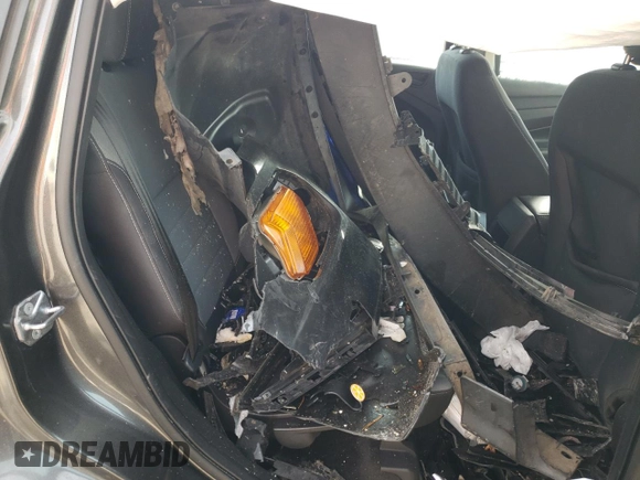 2018 Ford Escape S with VIN 1FMCU0F71JUD02540, listed as a Copart auction lot 54337495 with 102,619 mi miles and Salvage title. Bid and sale history available at DreamBid. Image 11.