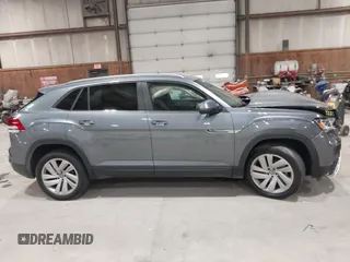 2022 Volkswagen Atlas SE z VIN 1V2KE2CA1NC206765, wystawiony jako IAAI lot #41876747 z przebiegiem 83 304 mil mil oraz . Historia ofert i sprzedaży dostępna na DreamBid. Obrazek 13.