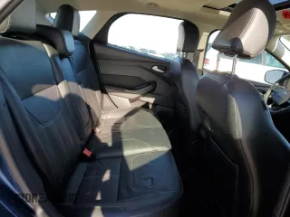 2018 Ford Focus Titanium z VIN 1FADP3N2XJL297048, wystawiony jako Copart lot #61579925 z przebiegiem 68 774 mil mil oraz Szkoda całkowita • Salvage title. Historia ofert i sprzedaży dostępna na DreamBid. Obrazek 10.