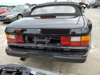 1990 Porsche 944 z VIN WP0CB2946LN480366, wystawiony jako Copart lot #74369454 z przebiegiem 78 709 mil mil oraz Szkoda całkowita • Salvage title. Historia ofert i sprzedaży dostępna na DreamBid. Obrazek 6.