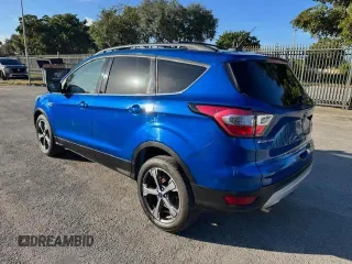 2017 Ford Escape SE with VIN 1FMCU0GD2HUA19806, listed as a Copart auction lot 54800235 with 97,697 mi miles and Salvage Title. Bid and sale history available at carsss.com. Image 2.