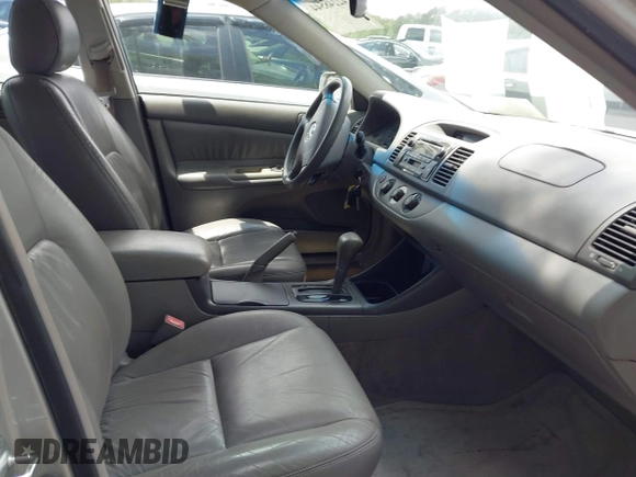2003 Toyota Camry LE with VIN 4T1BE32K73U157902, listed as a IAAI auction lot 42248544 with 106,675 mi miles and . Bid and sale history available at DreamBid. Image 5.
