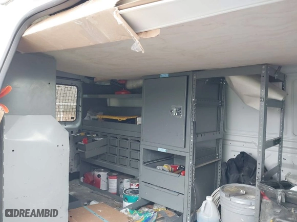 2011 Ford Econoline Cargo Van Commercial with VIN 1FTNE2EL6BDA76582, listed as a IAAI auction lot 41088478 with 105,002 mi miles. Bid and sale history available at carsss.com. Image 8.