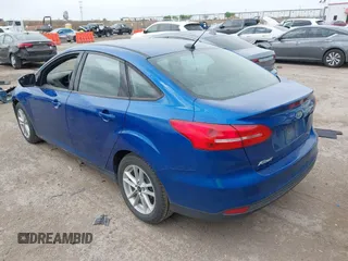 2018 Ford Focus SE with VIN 1FADP3F23JL210539, listed as a IAAI auction lot 41921226 with 100,609 mi miles. Bid and sale history available at carsss.com. Image 3.