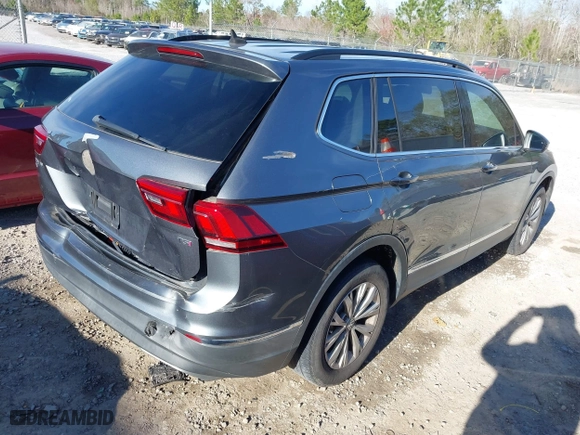 2018 Volkswagen Tiguan SEL with VIN 3VV3B7AX6JM015971, listed as a IAAI auction lot 41712580 with 138,681 mi miles. Bid and sale history available at carsss.com. Image 4.