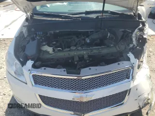 2012 Chevrolet Traverse LTZ z VIN 1GNKRLED5CJ233616, wystawiony jako Copart lot #52309145 z przebiegiem Nie podano mil oraz Szkoda całkowita • Salvage title. Historia ofert i sprzedaży dostępna na DreamBid. Obrazek 12.