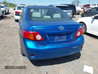 2009 Toyota Corolla with VIN 1NXBU40EX9Z065519, listed as a IAAI auction lot 42057981 with 201,480 mi miles. Bid and sale history available at carsss.com. Image 6.