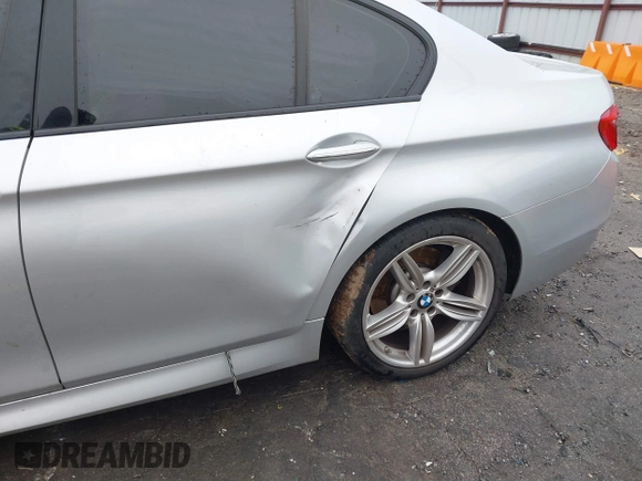 2013 BMW 5 Series 550i with VIN WBAFR9C57DDX80666, listed as a IAAI auction lot 41556020 with 137,418 mi miles and . Bid and sale history available at carsss.com. Image 18.