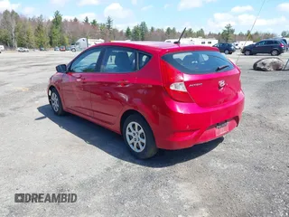 2013 Hyundai Accent GL with VIN KMHCT5AE9DU099021, listed as a IAAI auction lot 42094091 with 226,420 mi miles. Bid and sale history available at carsss.com. Image 3.