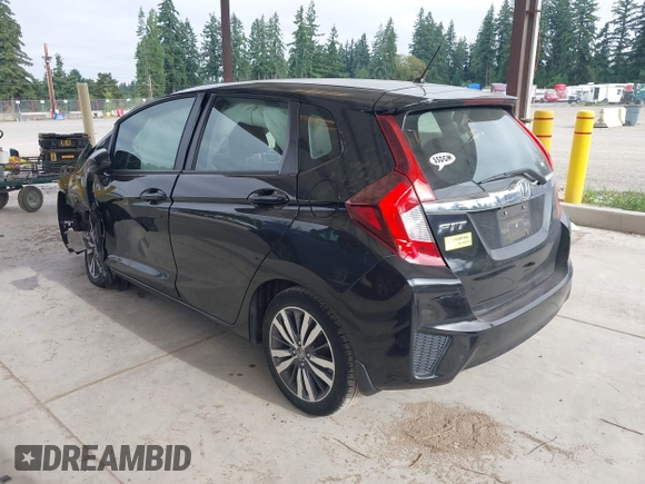 2015 Honda Fit EX-L z VIN 3HGGK5H81FM701122, wystawiony jako IAAI lot #42610165 z przebiegiem 74 969 mil mil oraz . Historia ofert i sprzedaży dostępna na DreamBid. Obrazek 3.