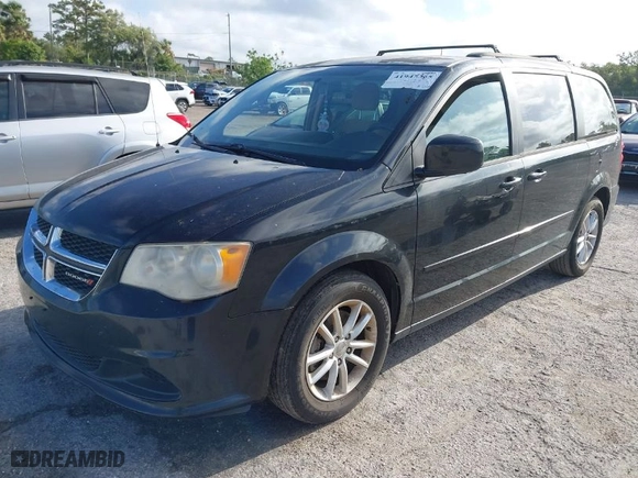 2013 Dodge Grand Caravan SXT with VIN 2C4RDGCG7DR714569, listed as a IAAI auction lot 41945365 with 134,002 mi miles. Bid and sale history available at carsss.com. Image 2.