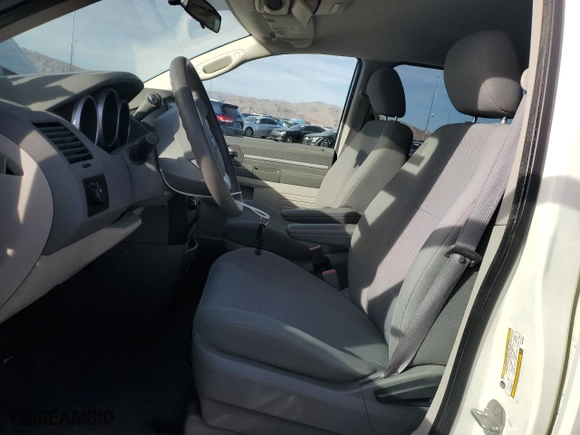 2009 Dodge Grand Caravan SE with VIN 2D8HN44E49R645062, listed as a Copart auction lot 47097115 with 82,295 mi miles and Salvage Title. Bid and sale history available at carsss.com. Image 7.