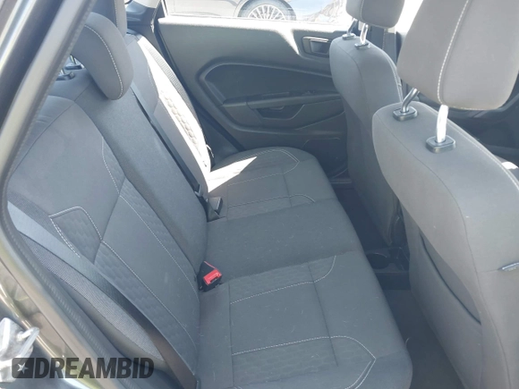 2019 Ford Fiesta SE z VIN 3FADP4BJ2KM131012, wystawiony jako IAAI lot #42228822 z przebiegiem 100 460 mil mil oraz . Historia ofert i sprzedaży dostępna na DreamBid. Obrazek 8.