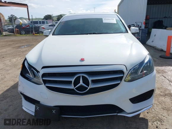 2014 Mercedes-Benz E 350 Sport z VIN WDDHF5KB7EA877606, wystawiony jako IAAI lot #41600100 z przebiegiem 99 682 mil mil oraz . Historia ofert i sprzedaży dostępna na DreamBid. Obrazek 13.