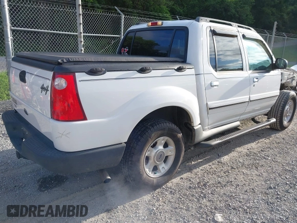 2003 Ford Explorer Sport Trac XLS z VIN 1FMZU77E33UA26042, wystawiony jako IAAI lot #42524905 z przebiegiem 124 878 mil mil oraz . Historia ofert i sprzedaży dostępna na DreamBid. Obrazek 4.