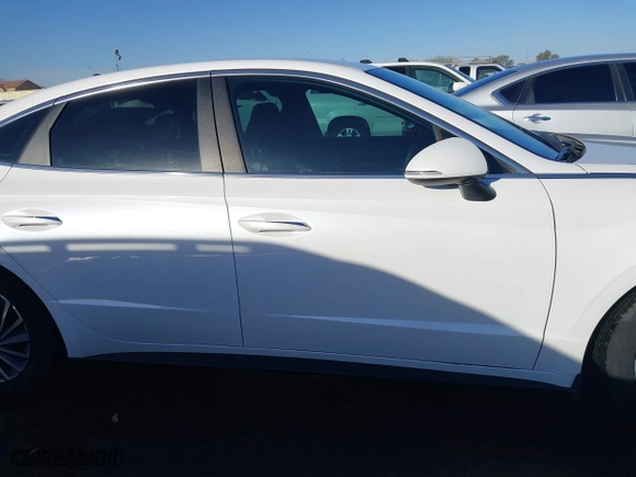 2021 Hyundai Sonata Hybrid SEL with VIN KMHL34JJ0MA024040, listed as a IAAI auction lot 41597221 with 54,891 mi miles. Bid and sale history available at carsss.com. Image 14.