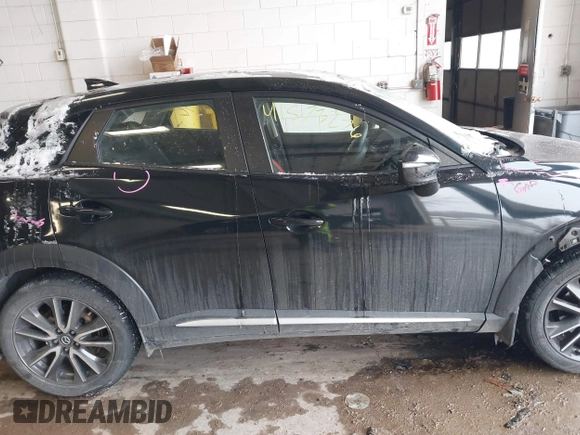 2016 Mazda CX-3 Grand Touring with VIN JM1DKFD71G0132801, listed as a IAAI auction lot 41573276 with 90,000 mi miles. Bid and sale history available at carsss.com. Image 13.