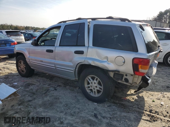 2004 Jeep Grand Cherokee Laredo z VIN 1J4GW48S84C200617, wystawiony jako Copart lot #51732045 z przebiegiem 171 452 mil mil oraz Nie do naprawy • Non repairable. Historia ofert i sprzedaży dostępna na DreamBid. Obrazek 2.