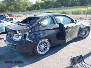 2014 BMW 2 Series M235i with VIN WBA1J7C50EVX33903, listed as a IAAI auction lot 40207684 with 81,766 mi miles and . Bid and sale history available at DreamBid. Image 4.