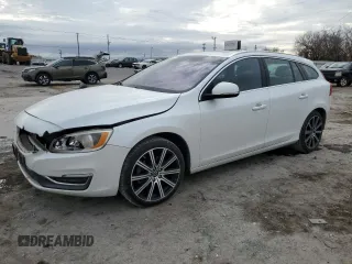 2015 Volvo V60 T5 Drive-E Premier with VIN YV140MEK2F1233829, listed as a Copart auction lot 83320544 with 143,632 mi miles and Salvage Title. Bid and sale history available at carsss.com. Image 1.