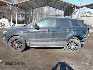 2015 Land Rover Range Rover Evoque Prestige with VIN SALVV2BG1FH960301, listed as a IAAI auction lot 41415373 with 112,960 mi miles and . Bid and sale history available at DreamBid. Image 14.