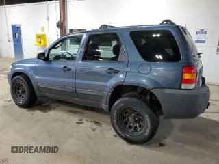 2005 Ford Escape XLT z VIN 1FMYU93145KB29172, wystawiony jako Copart lot #57724475 z przebiegiem 146 236 mil mil oraz Szkoda całkowita • Salvage title. Historia ofert i sprzedaży dostępna na DreamBid. Obrazek 2.