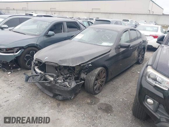 2018 BMW 5 Series 540i z VIN WBAJE5C5XJWA97667, wystawiony jako IAAI lot #41481362 z przebiegiem Nie podano mil oraz . Historia ofert i sprzedaży dostępna na DreamBid. Obrazek 2.