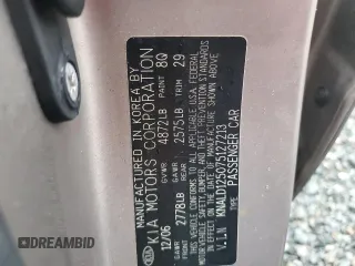 2007 Kia Amanti z VIN KNALD125075127213, wystawiony jako Copart lot #74394214 z przebiegiem Nie podano mil oraz Szkody całkowita. Historia ofert i sprzedaży dostępna na DreamBid. Obrazek 13.