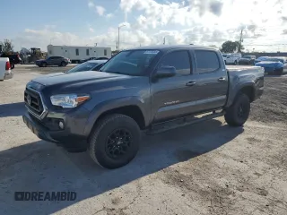 2020 Toyota Tacoma SR5 z VIN 3TMAZ5CN9LM125157, wystawiony jako Copart lot #57178885 z przebiegiem 59 830 mil mil oraz Szkoda całkowita • Salvage title. Historia ofert i sprzedaży dostępna na DreamBid. Obrazek 1.