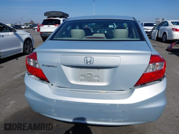 2012 Honda Civic LX with VIN 2HGFB2F58CH560126, listed as a IAAI auction lot 42097094 with 149,921 mi miles and . Bid and sale history available at DreamBid. Image 16.