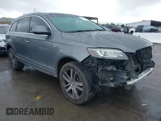 2015 Audi Q7 3.0T Premium Plus with VIN WA1LGAFE0FD031410, listed as a IAAI auction lot 41549288 with 112,519 mi miles. Bid and sale history available at carsss.com. Image 1.