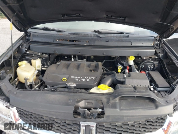 2013 Dodge Journey SE with VIN 3C4PDCAB0DT710609, listed as a IAAI auction lot 41763431 with 145,851 mi miles and . Bid and sale history available at DreamBid. Image 10.