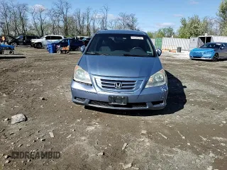 2010 Honda Odyssey EX-L z VIN 5FNRL3H75AB067634, wystawiony jako Copart lot #51538755 z przebiegiem 150 261 mil mil oraz Szkoda całkowita • Salvage title. Historia ofert i sprzedaży dostępna na DreamBid. Obrazek 12.