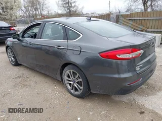 2019 Ford Fusion SEL with VIN 3FA6P0CDXKR129411, listed as a IAAI auction lot 42082323 with 126,048 mi miles and . Bid and sale history available at DreamBid. Image 3.
