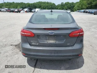 2017 Ford Focus SE with VIN 1FADP3F2XHL201380, listed as a Copart auction lot 56942815 with 136,169 mi miles and Salvage title. Bid and sale history available at DreamBid. Image 6.