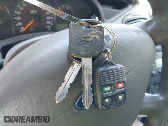 2004 Ford Focus SE z VIN 1FAFP36324W186481, wystawiony jako IAAI lot #42654016 z przebiegiem 168 331 mil mil oraz . Historia ofert i sprzedaży dostępna na DreamBid. Obrazek 11.