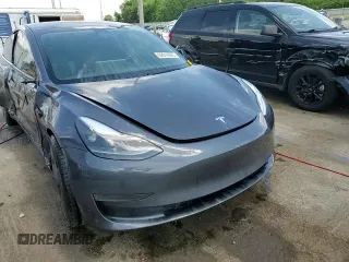 2023 Tesla Model 3 with VIN 5YJ3E1EA4PF614129, listed as a Copart auction lot 62019385 with 23,218 mi miles and Salvage title. Bid and sale history available at DreamBid. Image 13.