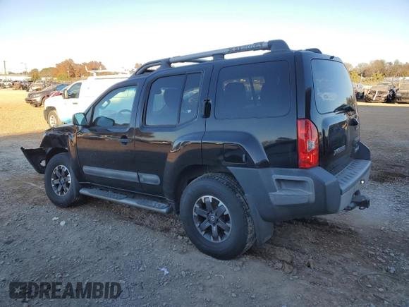 2014 Nissan Xterra X with VIN 5N1AN0NW9EN812437, listed as a Copart auction lot 83905504 with 118,805 mi miles and Salvage Title. Bid and sale history available at DreamBid. Image 2.