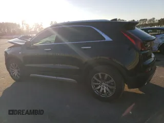 2020 Cadillac XT4 FWD Premium Luxury z VIN 1GYFZCR44LF056476, wystawiony jako Copart lot #43559495 z przebiegiem 51 076 mil mil oraz Szkody całkowita. Historia ofert i sprzedaży dostępna na DreamBid. Obrazek 2.