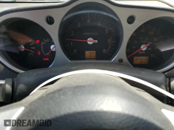 2003 Nissan 350Z Touring z VIN JN1AZ34EX3T016911, wystawiony jako Copart lot #54019395 z przebiegiem 163 228 mil mil oraz Czysty tytuł • Clean title. Historia ofert i sprzedaży dostępna na DreamBid. Obrazek 9.