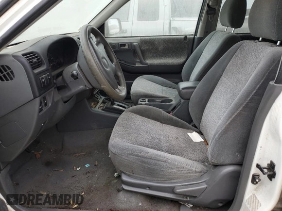 2002 Isuzu Rodeo S with VIN 4S2DM58W324327147, listed as a Copart auction lot 75194104 with Not Provided miles and Salvage Title. Bid and sale history available at DreamBid. Image 7.