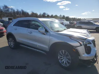 2022 Cadillac XT4 AWD Premium Luxury with VIN 1GYFZDR42NF100239, listed as a Copart auction lot 80175144 with 48,088 mi miles and Salvage Title. Bid and sale history available at carsss.com. Image 4.