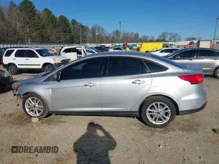 2016 Ford Focus SE with VIN 1FADP3F27GL390830, listed as a IAAI auction lot 41665012 with 119,673 mi miles. Bid and sale history available at carsss.com. Image 14.