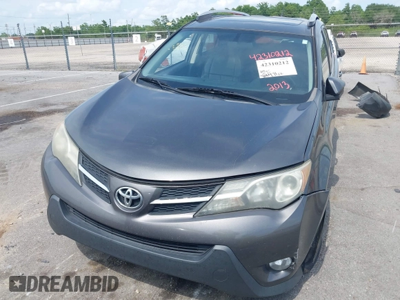2013 Toyota RAV4 XLE with VIN 2T3WFREV0DW051372, listed as a IAAI auction lot 42310212 with 206,471 mi miles and . Bid and sale history available at DreamBid. Image 13.